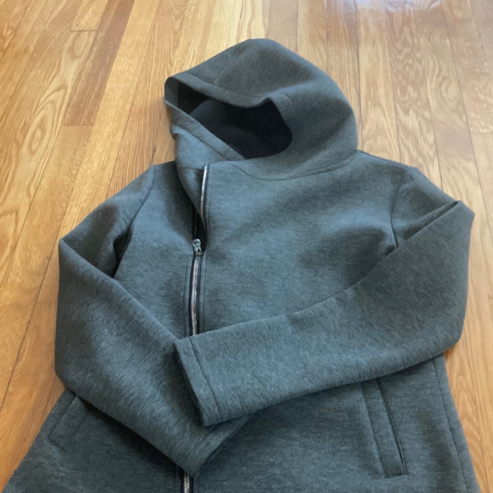 Grey hooded raincoat. give love get love for Betsy Johnson.